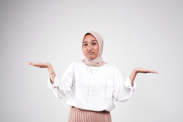 Fashion portrait of young beautiful asian muslim woman with wearing hijab isolated on white backgrou