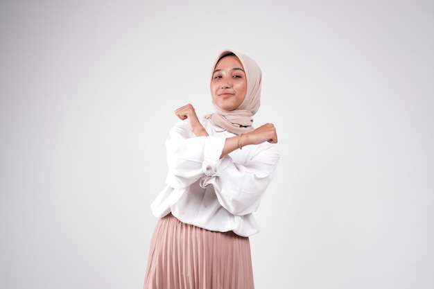 Fashion portrait of young beautiful asian muslim woman with wearing hijab isolated on white backgrou