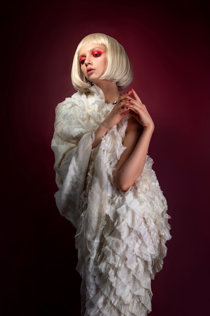 Fashion portrait of young blonde woman posing