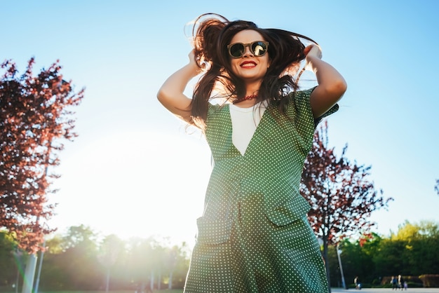 Fashion shine young girl enjoy life,laughing,joy on street