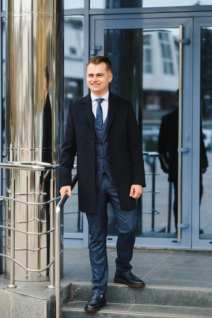 Fashion shot of a handsome young man in elegant classic suit