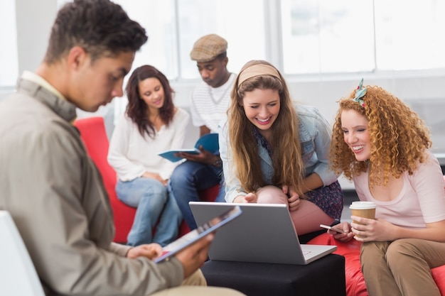 Fashion student using tablet pc