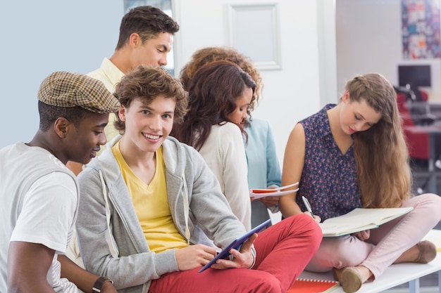 Fashion students reading their notes