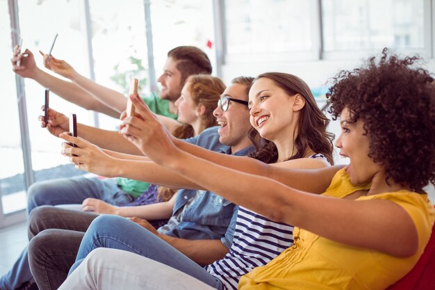 Fashion students taking a selfie 