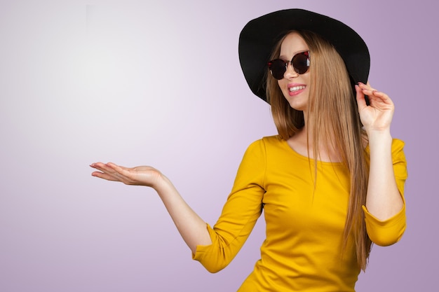 Fashion studio portrait of beautiful young fair hair woman