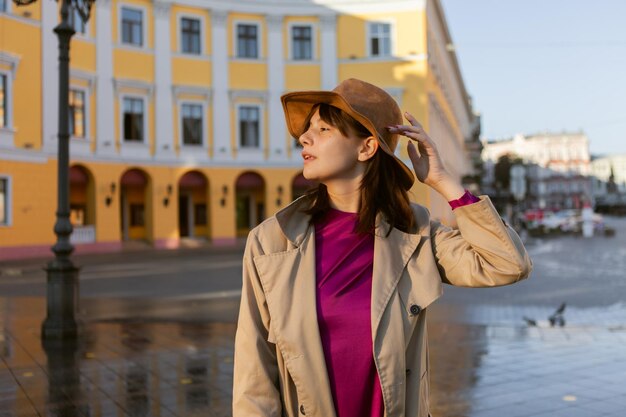 Fashion Woman in city after rain