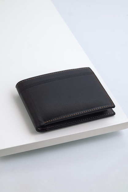 Fashionable black leather mens wallet isolated on white background