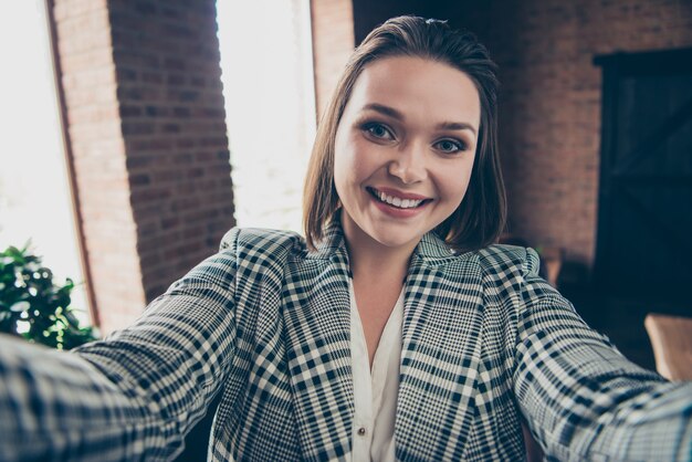 Fashionable businesswoman posing indoors