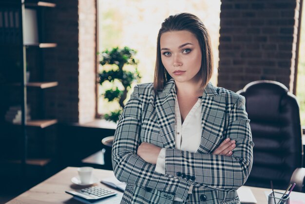 Fashionable businesswoman posing indoors