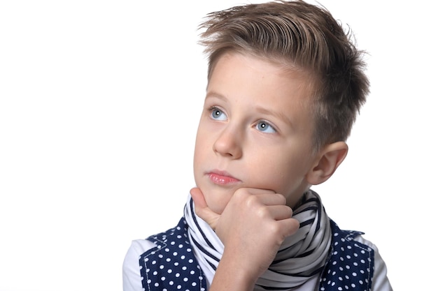 Fashionable cute boy, posing against white background