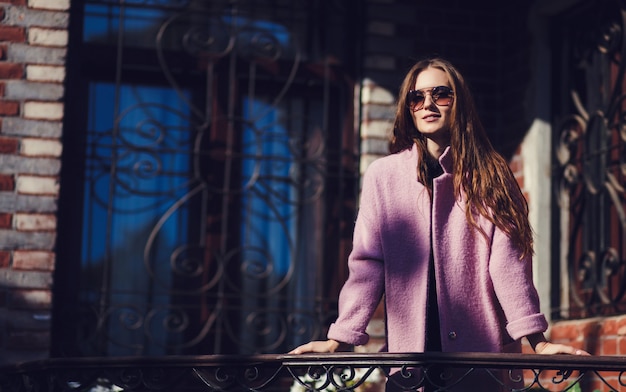 Fashionable girl walking on street