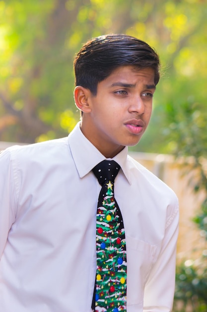 Young indian Boy using smartphone on white background. 5219901 Stock Photo  at Vecteezy