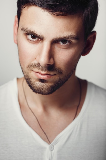 Fashionable male studio portrait. Caucasian white bug with bristles