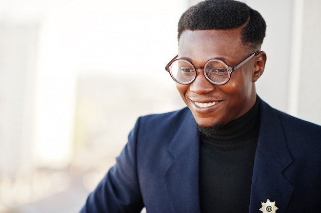 Fashionable man in suit and glasses