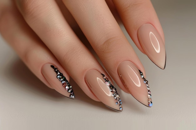 Fashionable model with French manicure and rhinestones beauty care