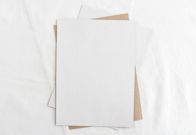 Photo fashionable stock stationery background white card for writing on a white table wedding feminine background