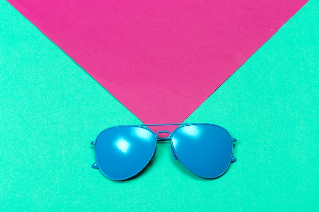 Fashionable sunglasses on minimal colorful