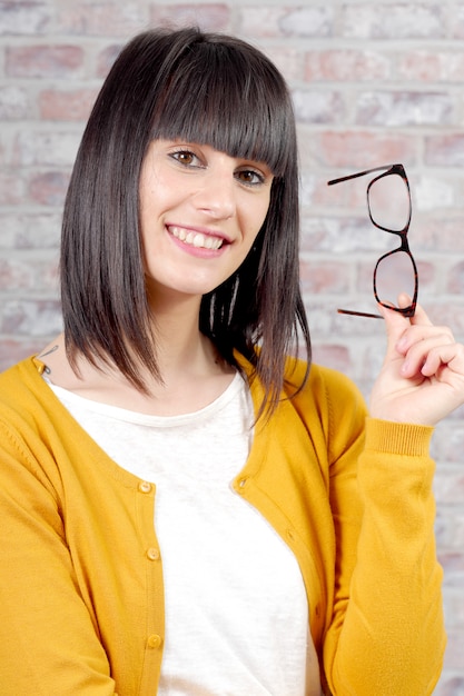 Fashionable woman wearing bright yellow clothes