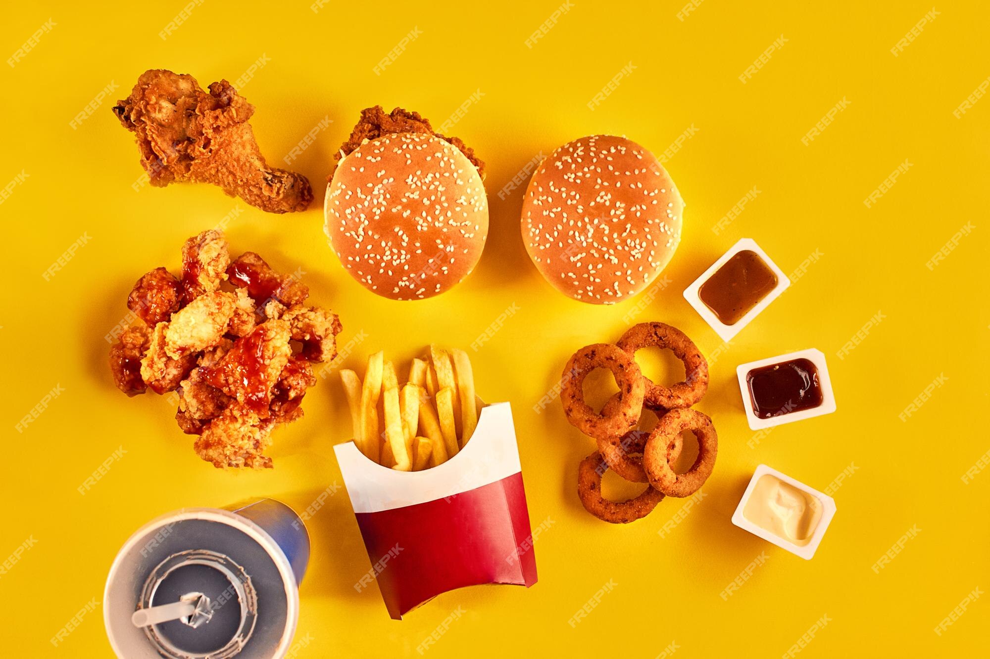 Premium Photo | Fast food dish top view french fries hamburger ...