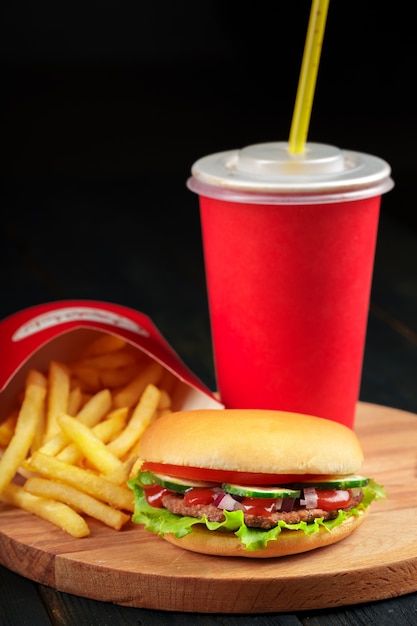 Fast food, homemade burger on wood