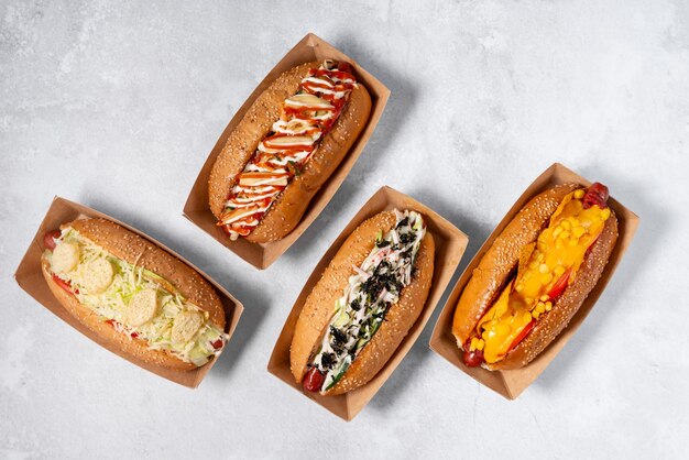 fast food hot dog banner on a light grey stone textured background, hotdog menu template