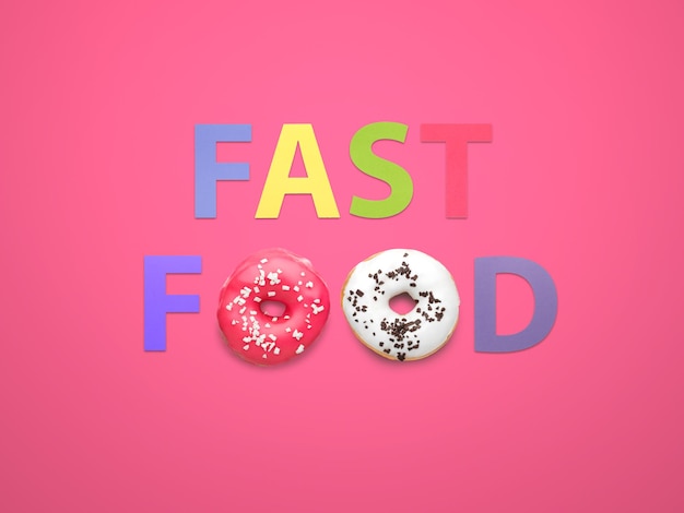 Photo fast food made with letters and doughnuts