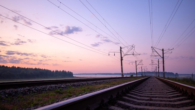 Fast traffic on rail flights. Towards sunset.