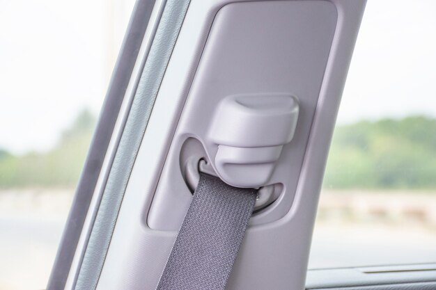 Photo fasten seat belt button for adjust in a car.