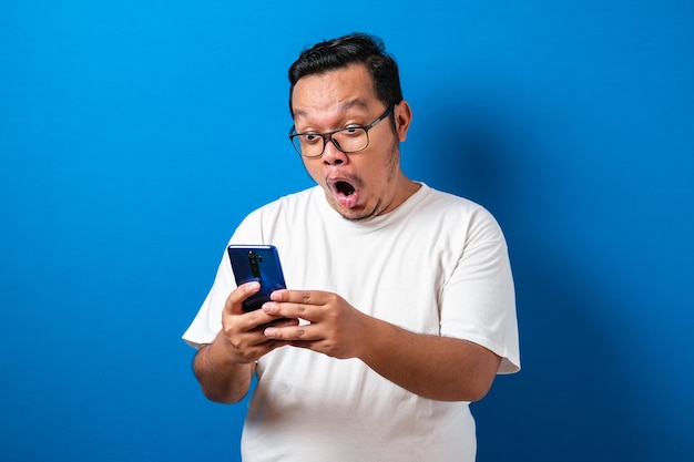 Fat Asian guy wearing a white T-shirt isolated