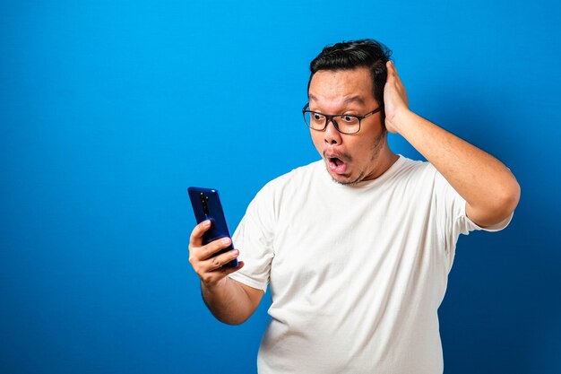 Fat Asian guy wearing a white T-shirt isolated