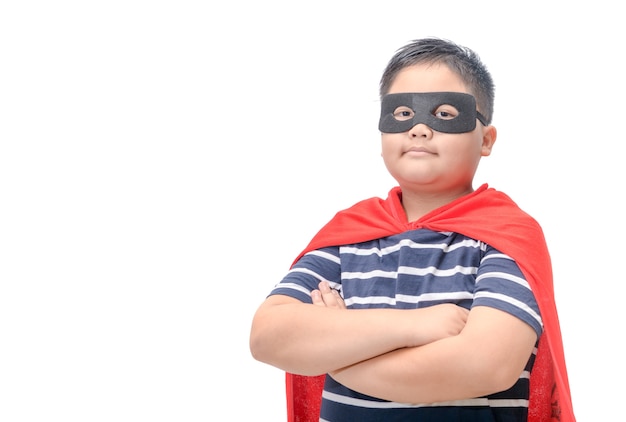 Fat child plays superhero isolated on white 