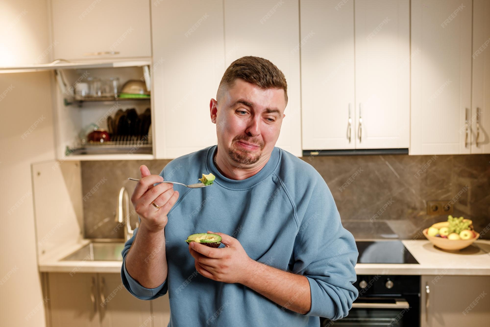 Premium Photo Fat And Funny Man Eating Avocado While Standing In premium-photo-fat-and-funny-man-eating-avocado-while-standing-in