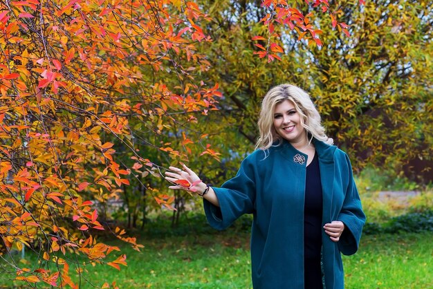 Fat girl in Golden autumn beautiful and gorgeous