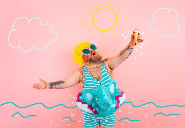 Photo fat man with beard and life buoy for children eats an icecream