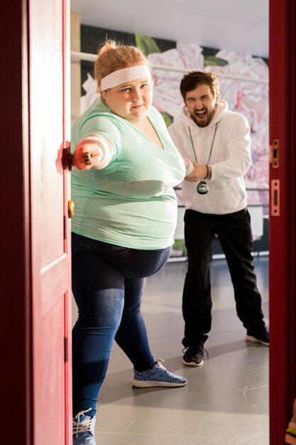 Fat woman escaping from training