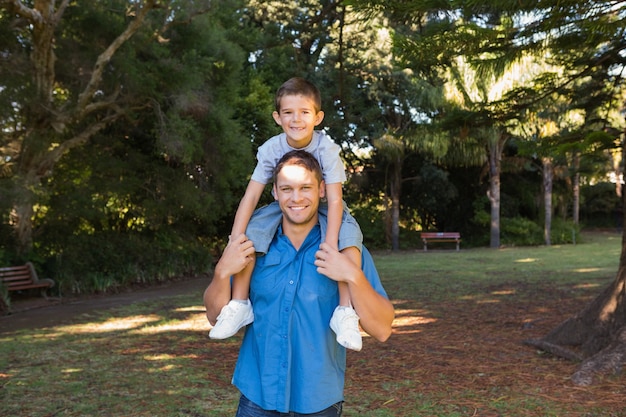 Father carrying his son