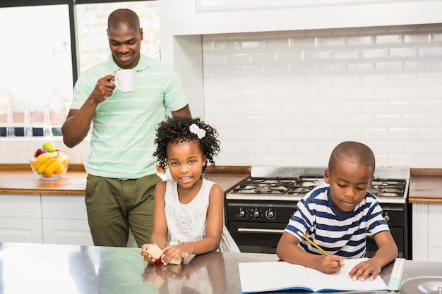 Father and children in the kitchen