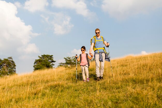 Father and daughter hiking