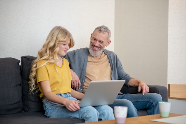 Father and daughter spending time together and discussing something