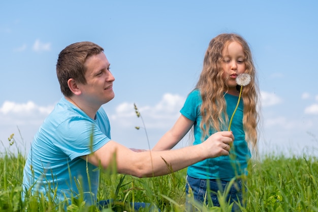 father and daughters spending time.