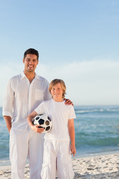 Father and  his son on the beach