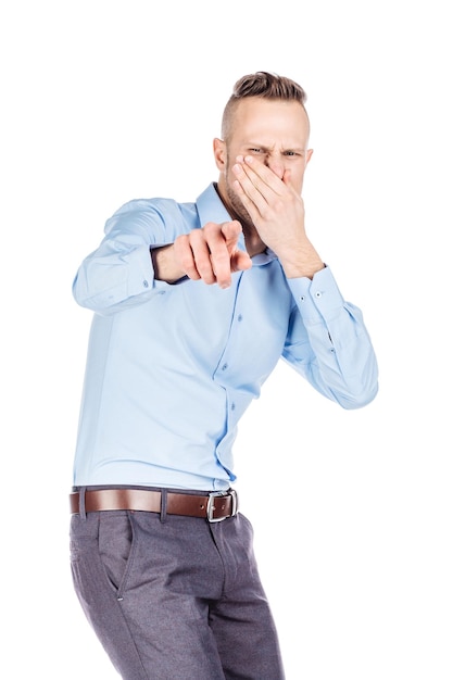 Father holding dirty dirty diaper in one hand fingers over white background Unpleasant smell stink