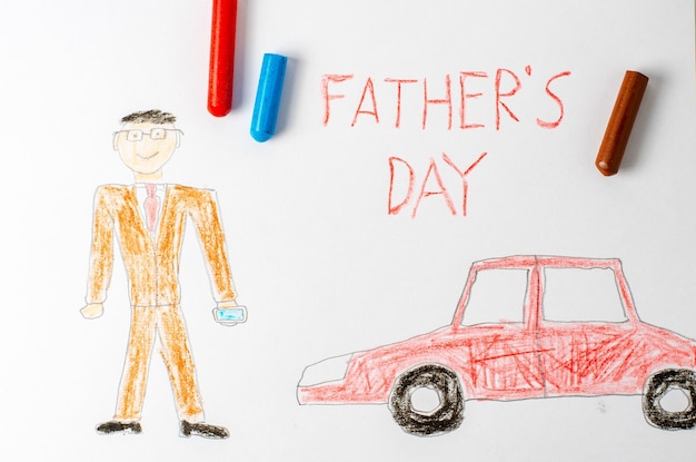 Фото Отец в костюме машина детский рисунок мелками надпись день отца