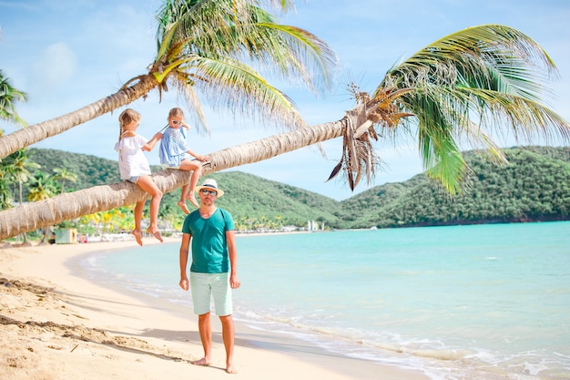 Father and kids enjoying beach summer vacation