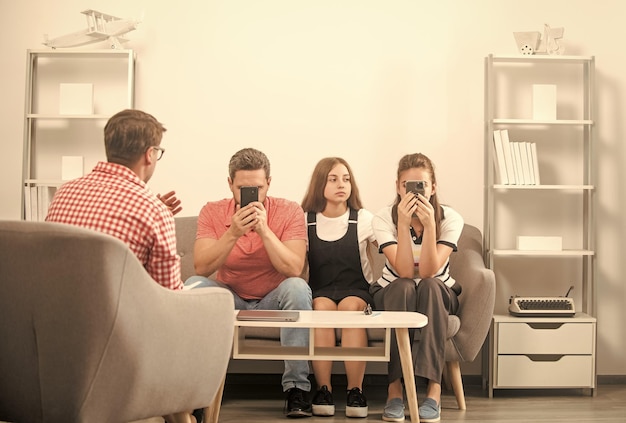 Father mother and child at psychologist session family therapy parents with kid