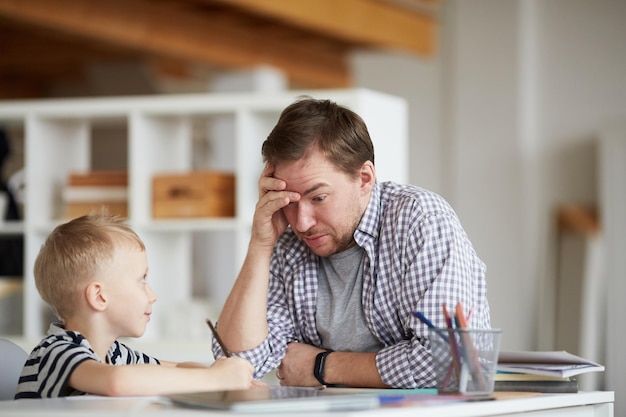 Father puzzled with sons home task solution