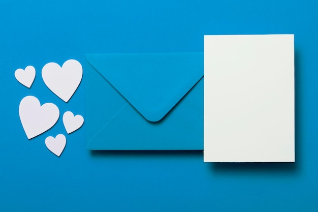 Father's Day card mockup Blue envelope blank white card and hearts