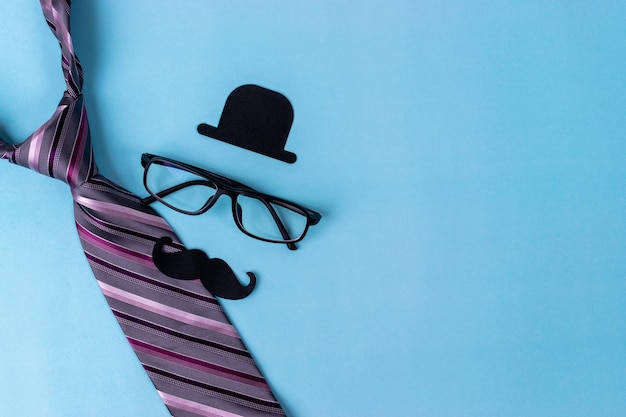 Father's day concept. Black sign of hat, mustache, glasses, tie