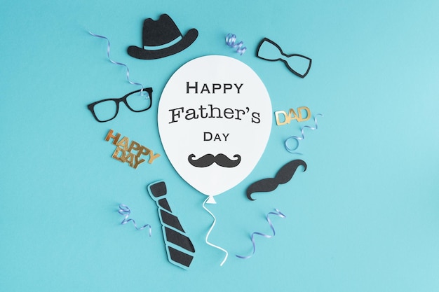 Father's Day greeting balloon card with decoration on blue background Copy space