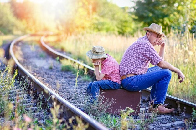 Father and son cowboys concept happiness together